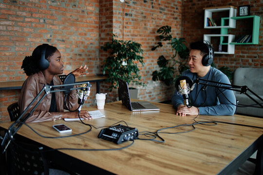 Woman telling to speaker about her podcast