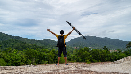 Obraz premium Professional man Photography on high mountain take a picture Landscape nature view at Phuket Thailand