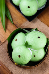 Asian steamed buns, In Indonesia called Bakpao or Bapao. Green Bakpao with Chocolate inside