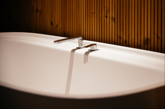 Modern bathtub in bathroom