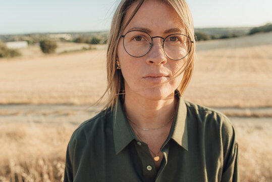 Portrait of a woman looking straight to the camera