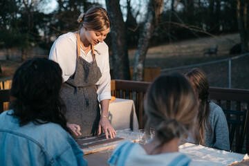 Artisan teaches a diy workshop outdoors
