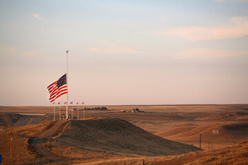 An American flag flies over rural Montana.