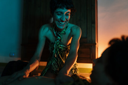 Woman giving a tantric massage