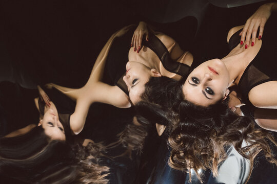 A portrait of a girl with her multiple distorted reflections.