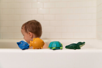 Little boy taking a bath