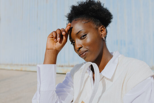 Young african woman looking at camera
