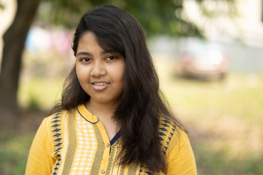 Portrait of a cute Indian teenage girl looking at camera