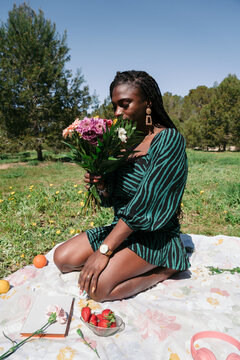 Woman holding a flower bouquet