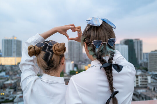 funny young Asian female friends portrait