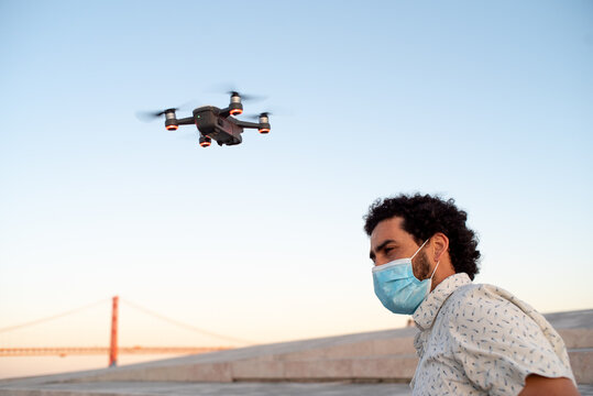 Video maker wearing a covid mask 