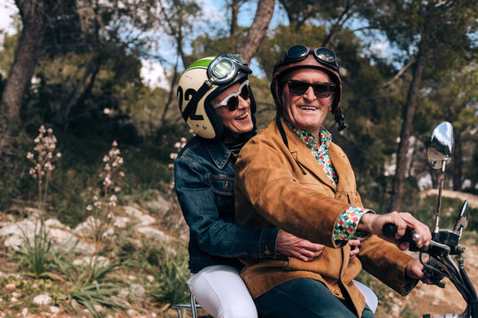 Middle-aged couple on a motorbike