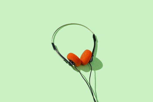 retro headphones on a green background
