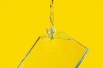 water pouring from a rectangular bottle