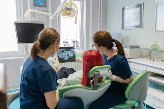 Dentist treating patient 