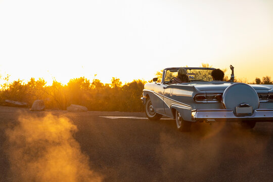 Road Trip in Vintage Automobile  in Arizona at Sunset