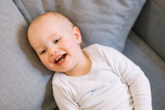 Deciduous teeth laughing baby portrait