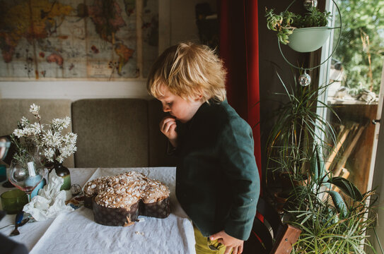 A child eating traditional Easter cake