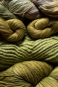 Closeup of yarn textures in green shades