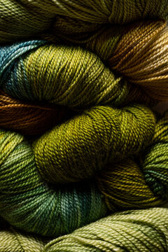 Closeup of yarn textures in green shades