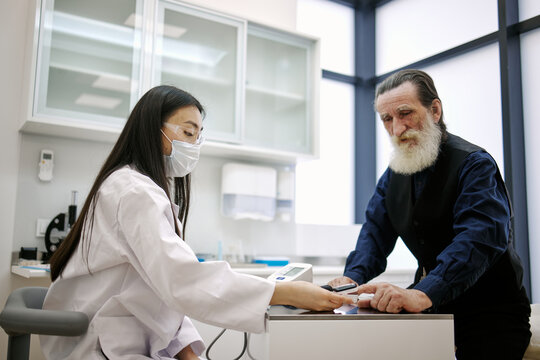Man receiving medical help in clinic 