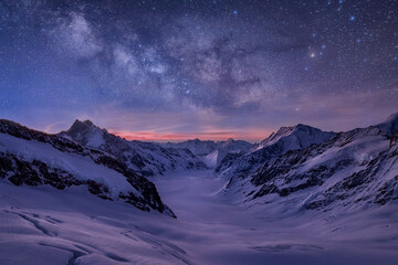 Milky way over Aletsch glacier in the alps