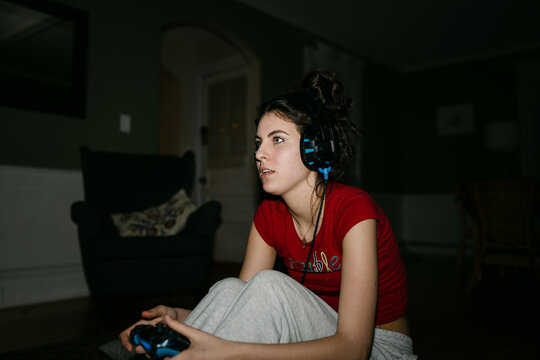 young woman playing video games 