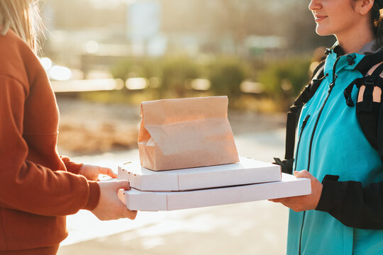 Delivery Girl Delivering Food to Customer 