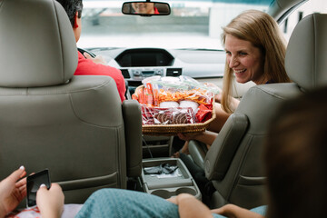 Mom With Snacks On Road Trip