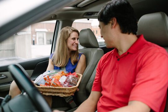 Mom With Snacks On Road Trip