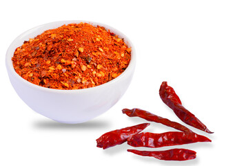 Cayenne pepper in white ceramic bowl , Dry red chili isolated on white background  .