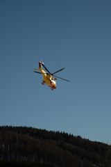 Fototapeta na wymiar rescue helicopter in the blue