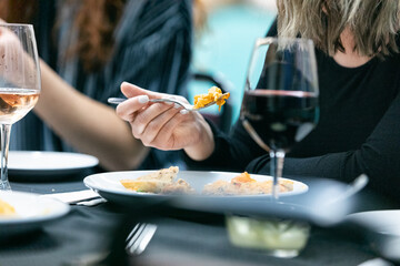 Class: Woman Eats Paella She Made