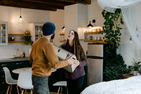 Woman Pushes Suitcase to Ex as they Breakup