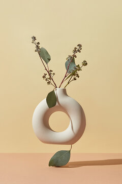 Beautiful ceramic vase on leaf