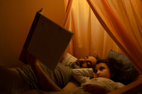 Father and daughter at bedtime 