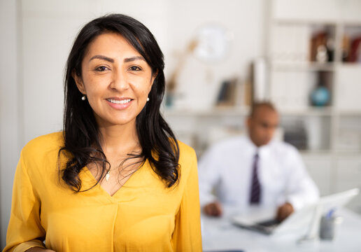 Portrait of a positive business woman in the office. High quality photo