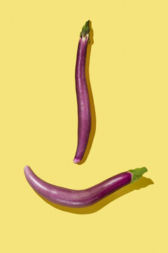 long japanese eggplants forming a smiley face