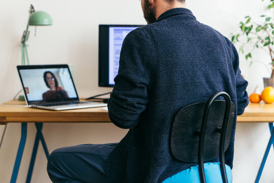 Adult man having a business video call conversation 