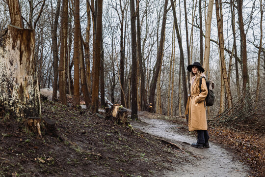 Woman in hat and coat