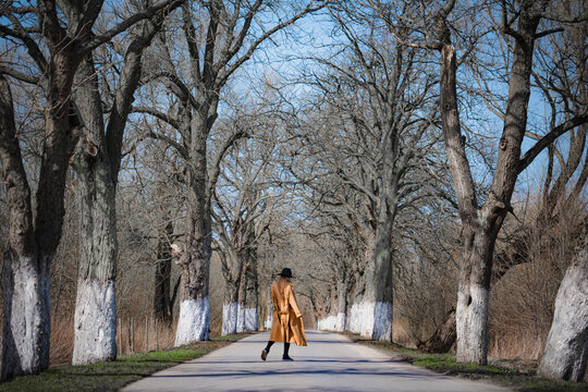Woman in hat and coat