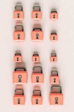 Pink padlocks on grey background
