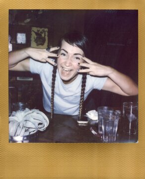 Woman Smiling With Hands