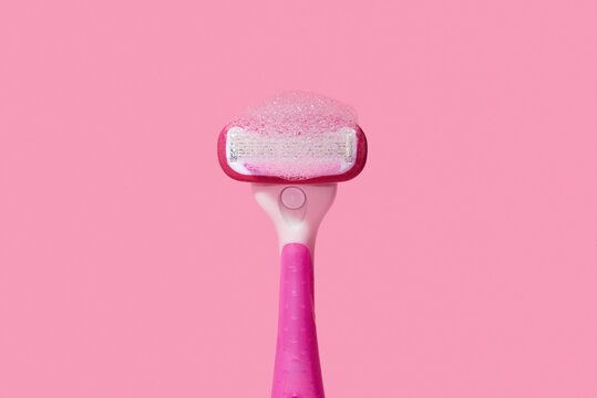 pink razor and foam