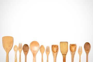 wooden kitchen utensils on white background
