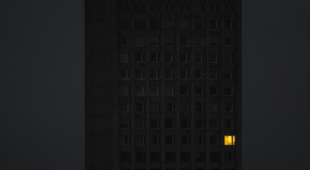 Dark office skyscraper in the evening