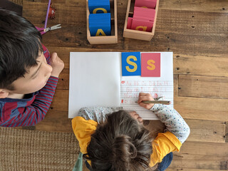 Child learning the alphabet letters