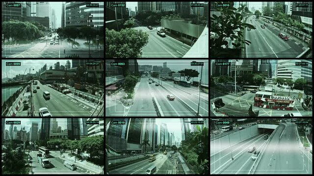 Cctv Surveillance camera monitoring highway roads in Hong Kong city.