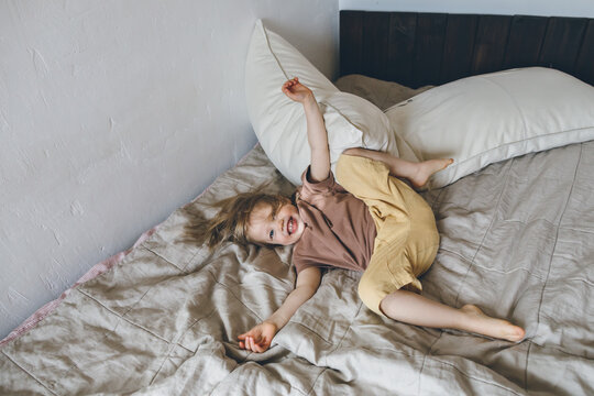 Child indulges in the bedroom 