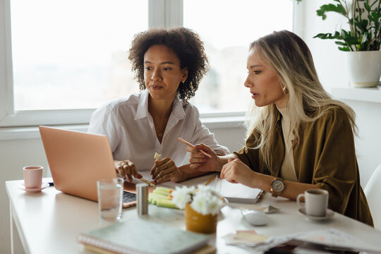 Women Working On Problem Solving 